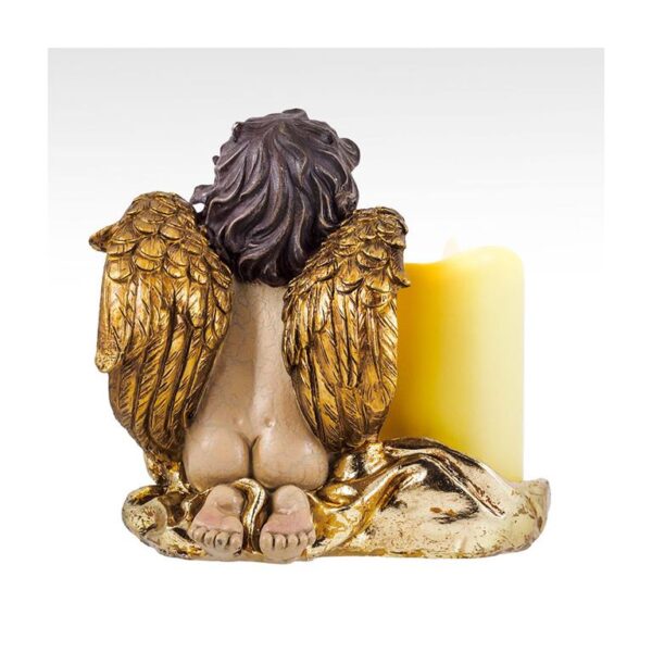 Angel kneeling with candle