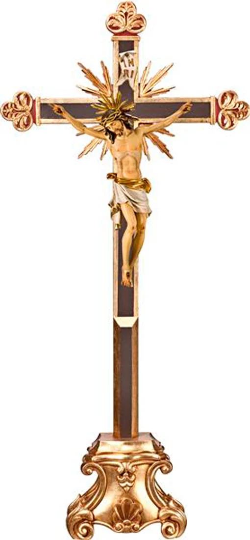 Crucifix, cross clover shape with rays on table