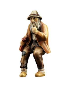 Man sitting without bench (Rustic Nativity)