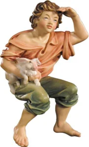 Pastor sentado con conejo