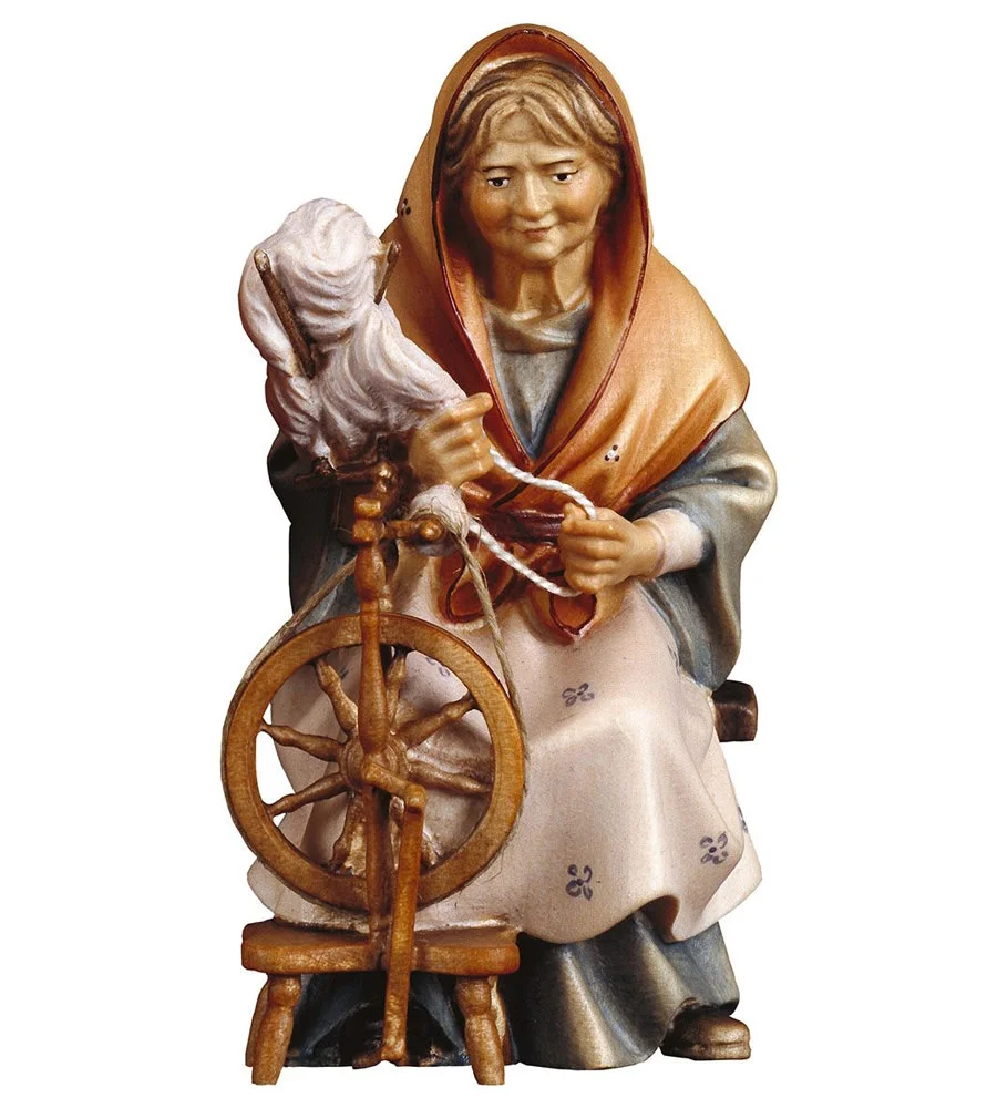 Shepherdess with spinning wheel (Casales Nativity)
